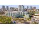 Aerial view of a modern condo building in a vibrant city setting at 912 Channelside Dr # 2320, Tampa, FL 33602
