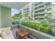 Private balcony overlooking the community pool and courtyard at 912 Channelside Dr # 2320, Tampa, FL 33602