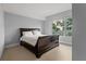 Primary bedroom with a dark wood sleigh bed and ample floor space at 912 Channelside Dr # 2320, Tampa, FL 33602