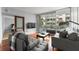 Living room with hardwood floors and access to a private balcony at 912 Channelside Dr # 2320, Tampa, FL 33602