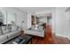Living room with hardwood floors, gray sofas, and views to the kitchen at 912 Channelside Dr # 2320, Tampa, FL 33602