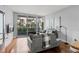 Living room with hardwood floors and sliding glass doors leading to a balcony at 912 Channelside Dr # 2320, Tampa, FL 33602