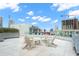 Relaxing rooftop patio with comfortable seating and city views at 912 Channelside Dr # 2320, Tampa, FL 33602