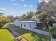 Aerial view of the house showing the backyard and neighborhood at 918 Windward Way, Palm Harbor, FL 34685