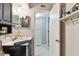 Updated bathroom with subway tile, new vanity, and modern fixtures at 918 Windward Way, Palm Harbor, FL 34685