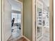 Clean bathroom with a shower/tub combo and wood vanity at 918 Windward Way, Palm Harbor, FL 34685