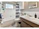 Simple bathroom, shower/tub combo and updated vanity at 918 Windward Way, Palm Harbor, FL 34685