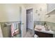 Clean bathroom with vanity and view of closet at 918 Windward Way, Palm Harbor, FL 34685