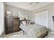 Bedroom with double bed, dresser, and lots of closet space at 918 Windward Way, Palm Harbor, FL 34685