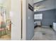 Hallway showing access to bathroom and bedroom at 918 Windward Way, Palm Harbor, FL 34685