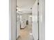 View down hallway to kitchen and front door at 918 Windward Way, Palm Harbor, FL 34685