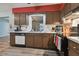 Kitchen with stainless steel appliances and wood cabinets at 918 Windward Way, Palm Harbor, FL 34685