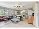 Cozy living room with a sectional sofa and access to the kitchen at 918 Windward Way, Palm Harbor, FL 34685