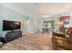 Open living space with hardwood floors, showing the living and dining areas at 918 Windward Way, Palm Harbor, FL 34685