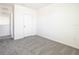 Spacious bedroom with grey carpet and closet at 9231 Forge Breeze Loop, Wesley Chapel, FL 33545