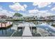 Expansive dock offering serene waterfront views at 13806 San Juan Ave, Hudson, FL 34667