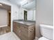 Modern bathroom with granite countertop, new vanity, and updated fixtures at 1401 26Th N Ave, St Petersburg, FL 33704
