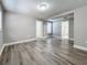 Large bedroom with wood-like floors and an ensuite bathroom at 1401 26Th N Ave, St Petersburg, FL 33704