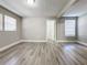 Spacious bedroom with wood-look floors and a large closet at 1401 26Th N Ave, St Petersburg, FL 33704