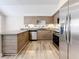Modern kitchen with stainless steel appliances and granite counters at 1401 26Th N Ave, St Petersburg, FL 33704
