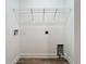Laundry room with wire shelving and a built-in space for washer and dryer at 1401 26Th N Ave, St Petersburg, FL 33704