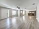 Spacious living room with light wood flooring and open floor plan at 1401 26Th N Ave, St Petersburg, FL 33704