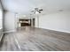 Spacious living room with hardwood floors and ceiling fan at 1401 26Th N Ave, St Petersburg, FL 33704