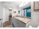 Updated bathroom with granite countertops and modern vanity at 1591 Gulf Blvd # 504S, Clearwater Beach, FL 33767