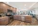 Modern kitchen with granite countertops and stainless steel appliances at 1591 Gulf Blvd # 504S, Clearwater Beach, FL 33767