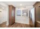 Kitchen with wood cabinets, stainless steel appliances, and water views at 1591 Gulf Blvd # 504S, Clearwater Beach, FL 33767