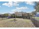 House with a screened porch and large backyard at 16020 Starling Crossing Dr, Lithia, FL 33547