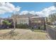 Home with a screened patio and fenced-in backyard at 16020 Starling Crossing Dr, Lithia, FL 33547