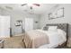 Primary bedroom with a queen bed, closet, and neutral decor at 16020 Starling Crossing Dr, Lithia, FL 33547