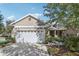 Charming one-story home with a two-car garage and well-manicured landscaping at 16020 Starling Crossing Dr, Lithia, FL 33547