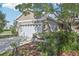 Two-story house with a two-car garage at 16020 Starling Crossing Dr, Lithia, FL 33547