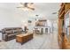 Open concept living and dining area with a view into the kitchen at 16020 Starling Crossing Dr, Lithia, FL 33547