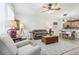 Open concept living and dining area with a view into the kitchen at 16020 Starling Crossing Dr, Lithia, FL 33547
