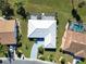 Top-down aerial view of house, pool, and surrounding neighborhood at 1906 Wolf Laurel Dr, Sun City Center, FL 33573