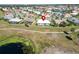 High-angle view of the house and surrounding neighborhood at 1906 Wolf Laurel Dr, Sun City Center, FL 33573