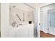 Walk-in bathtub with safety bars; accessible bathroom at 1906 Wolf Laurel Dr, Sun City Center, FL 33573