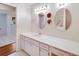 Bathroom features a double vanity with ample counter space at 1906 Wolf Laurel Dr, Sun City Center, FL 33573