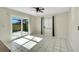 Bright dining room with tile floors and sliding glass doors leading to a patio at 1906 Wolf Laurel Dr, Sun City Center, FL 33573