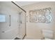 Clean shower with glass enclosure and tiled walls at 1906 Wolf Laurel Dr, Sun City Center, FL 33573