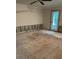 Bedroom with ceiling fan and door to the outside at 200 Carmona Ne Way, St Petersburg, FL 33704