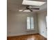 Spacious bedroom with wood floors, skylights, and plantation shutters at 200 Carmona Ne Way, St Petersburg, FL 33704