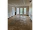 Dining room with white wainscoting and French doors at 200 Carmona Ne Way, St Petersburg, FL 33704