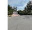 Light pink house with a two-car garage and neatly trimmed hedges at 200 Carmona Ne Way, St Petersburg, FL 33704