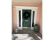 Green front door with a wreath, and white columns at 200 Carmona Ne Way, St Petersburg, FL 33704