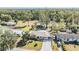 Overhead view of the house and surrounding landscape at 40126 Proud Mockingbird Rd, Zephyrhills, FL 33540