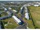 Aerial view of condo community showcasing building arrangement and surrounding area at 4514 3Rd Street W Cir # 328, Bradenton, FL 34207